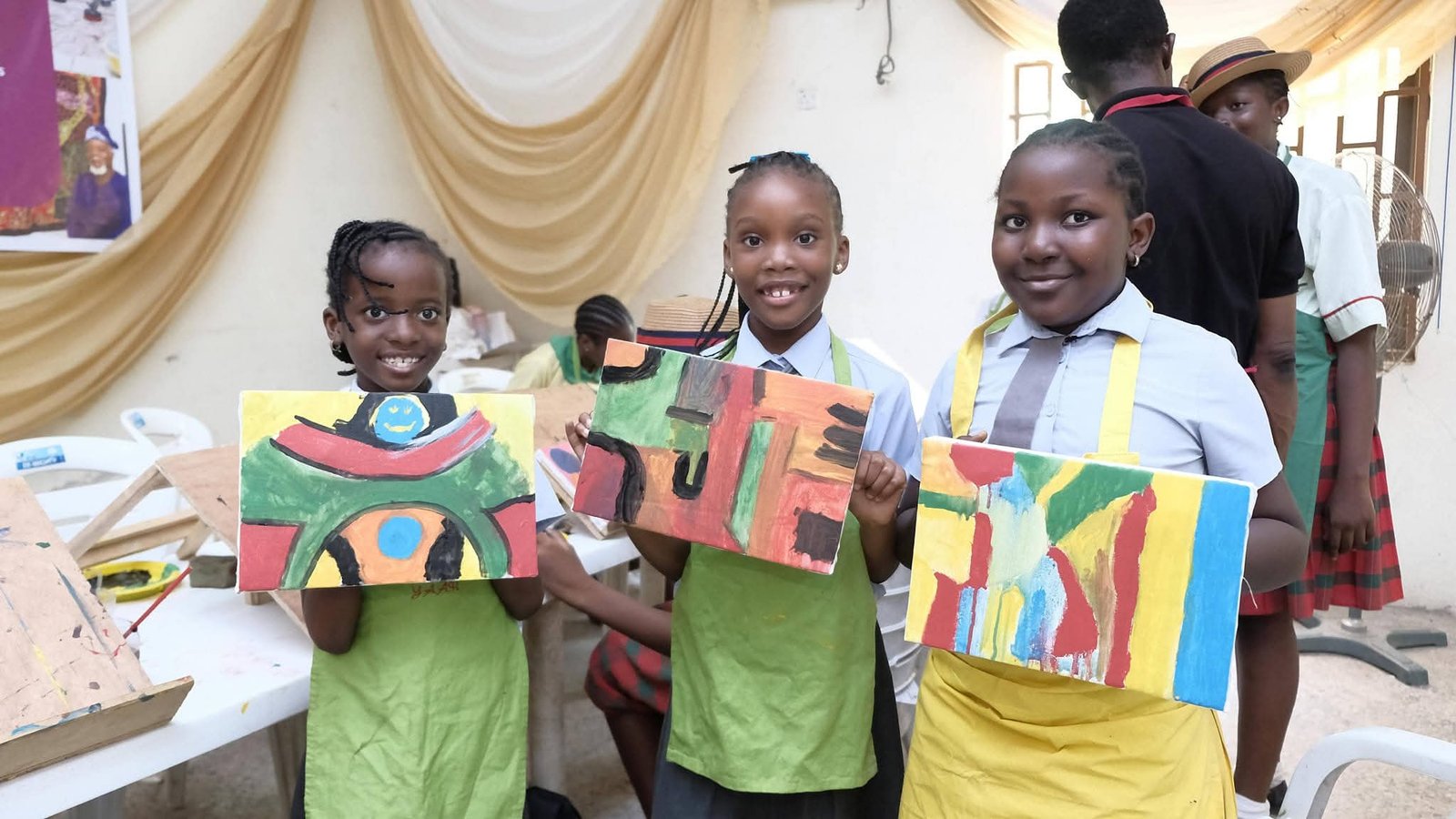 Young people participating in creative artwork